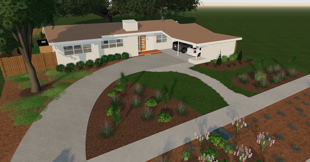 A low white concrete-block house with a carport, a curved drive, mulched beds of native grasses and a wood fence, seen from above